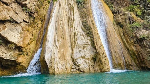Neer Garh Waterfall with turquoise blue pool in Rishikesh Uttarakhand