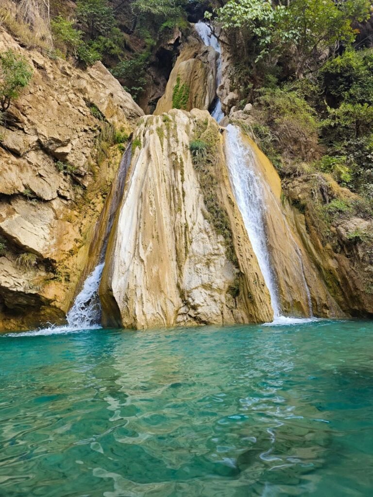 Neer Garh Waterfall with turquoise blue pool in Rishikesh Uttarakhand